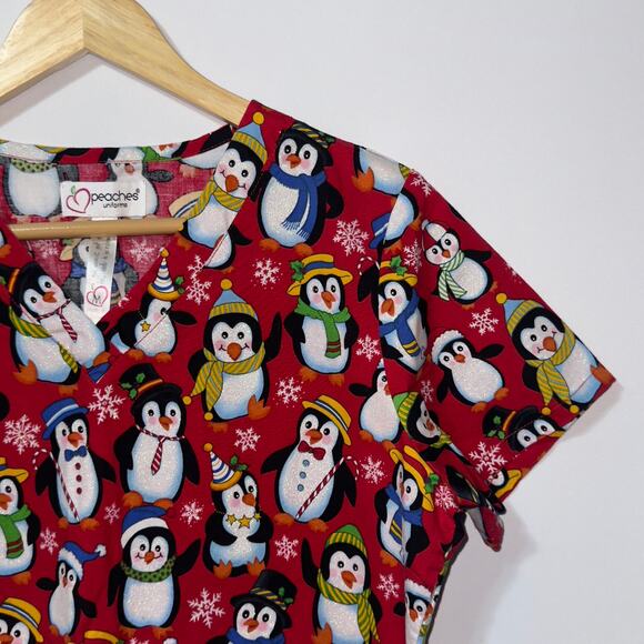 Peaches Uniforms short sleeve Penguin holiday scrub top women’s size medium - Picture 3 of 7